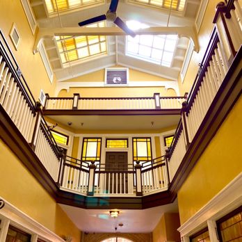 Stained glass skylights and second-floor balcony above the Rhodesbilt Arcade atrium